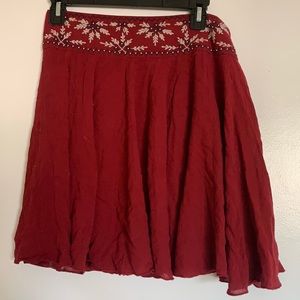 Red lined flora embroidered skater skirt